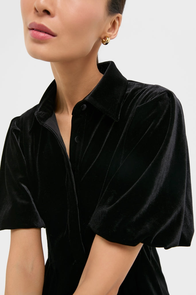 Black Velvet Mini Delaney Dress with a classic spread collar and puff sleeves, creating an effortless, high-end look for any fun occasion.