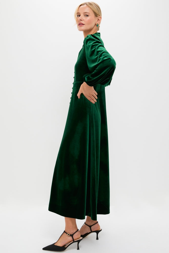 Green Velvet Serena Dress: A classic, high-end velvet maxi with effortless balloon sleeves and a fitted waist, styled with fun slingback heels and earrings.