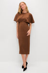 Model in Chocolate Brown Cape Leah Dress with flowing overlay, styled with pointed-toe black pumps. A classic, effortless look that embodies high-end fashion and fun.