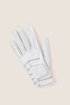 White Left Hand Golf Glove with classic zig-zag stitching, fun perforations for airflow, and a high-end Velcro strap featuring Tuckernuck's logo for an effortless swing.