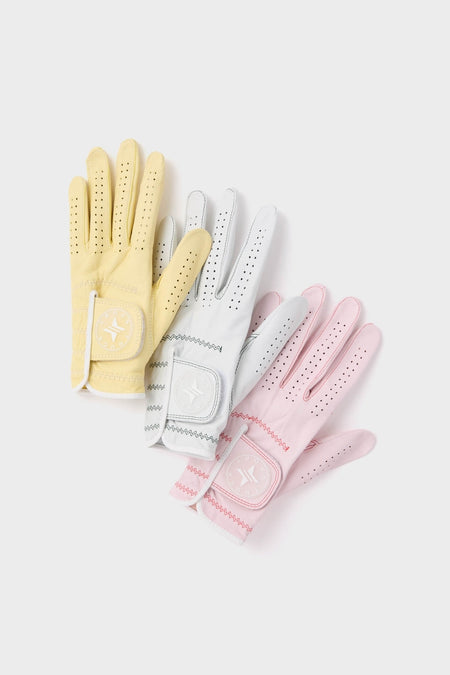 Classic White Left Hand Golf Glove with breathable perforations and star-embossed Velcro tab, offering effortless comfort and a high-end touch for fun golfing adventures.