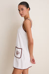 Blanc Shell Embroidered Terrycloth Dress Coverup features an effortless, classic shift silhouette with chic brown trim and shell embroidery, perfect for fun, high-end beach-to-barbecue style.