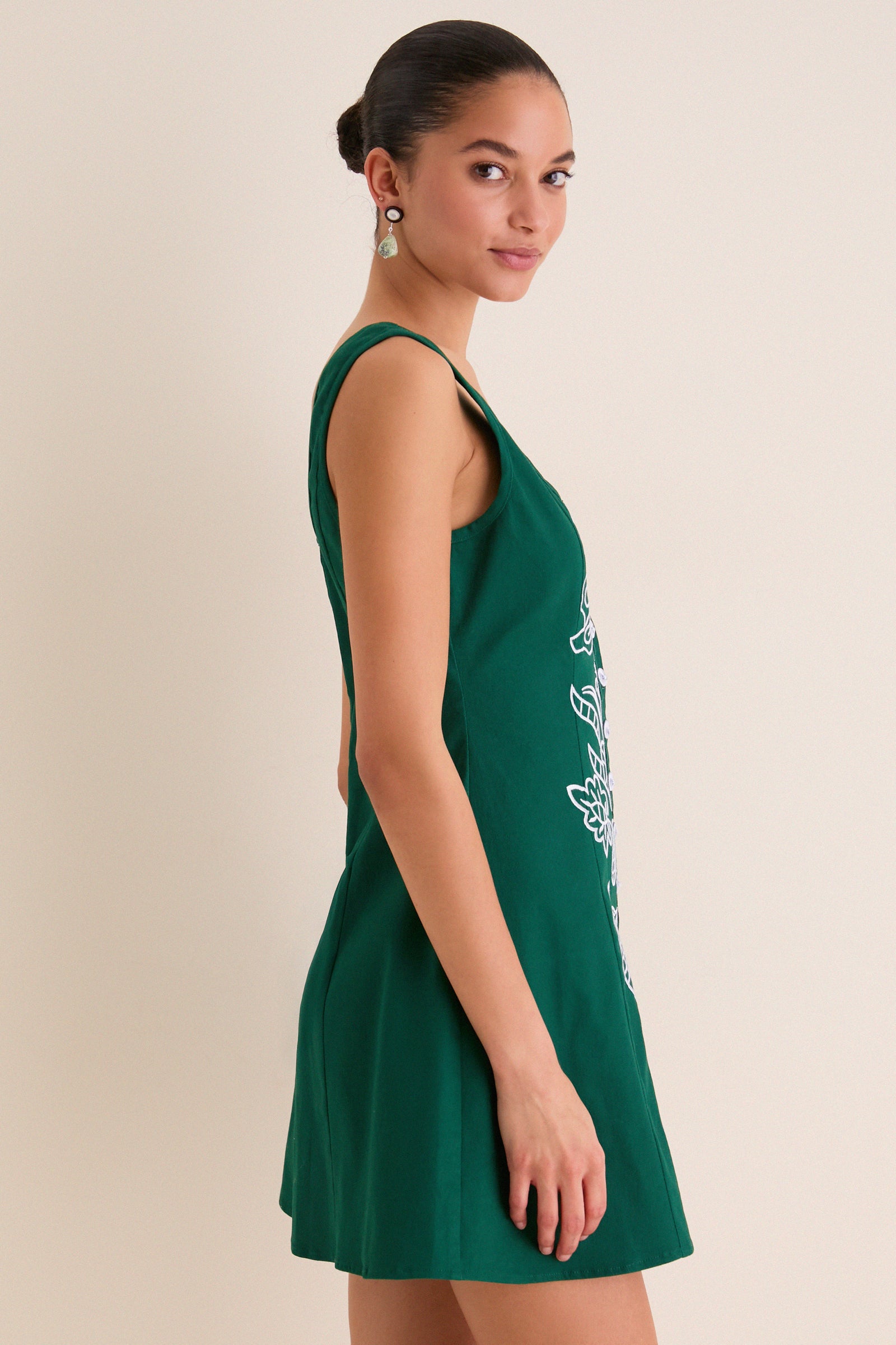 Green & Baby Blue Embroidered Lucy Mini Dress: A classic sleeveless fit-and-flare design with floral embroidery and square neckline. Effortlessly combines fun and high-end style for warm-weather elegance.