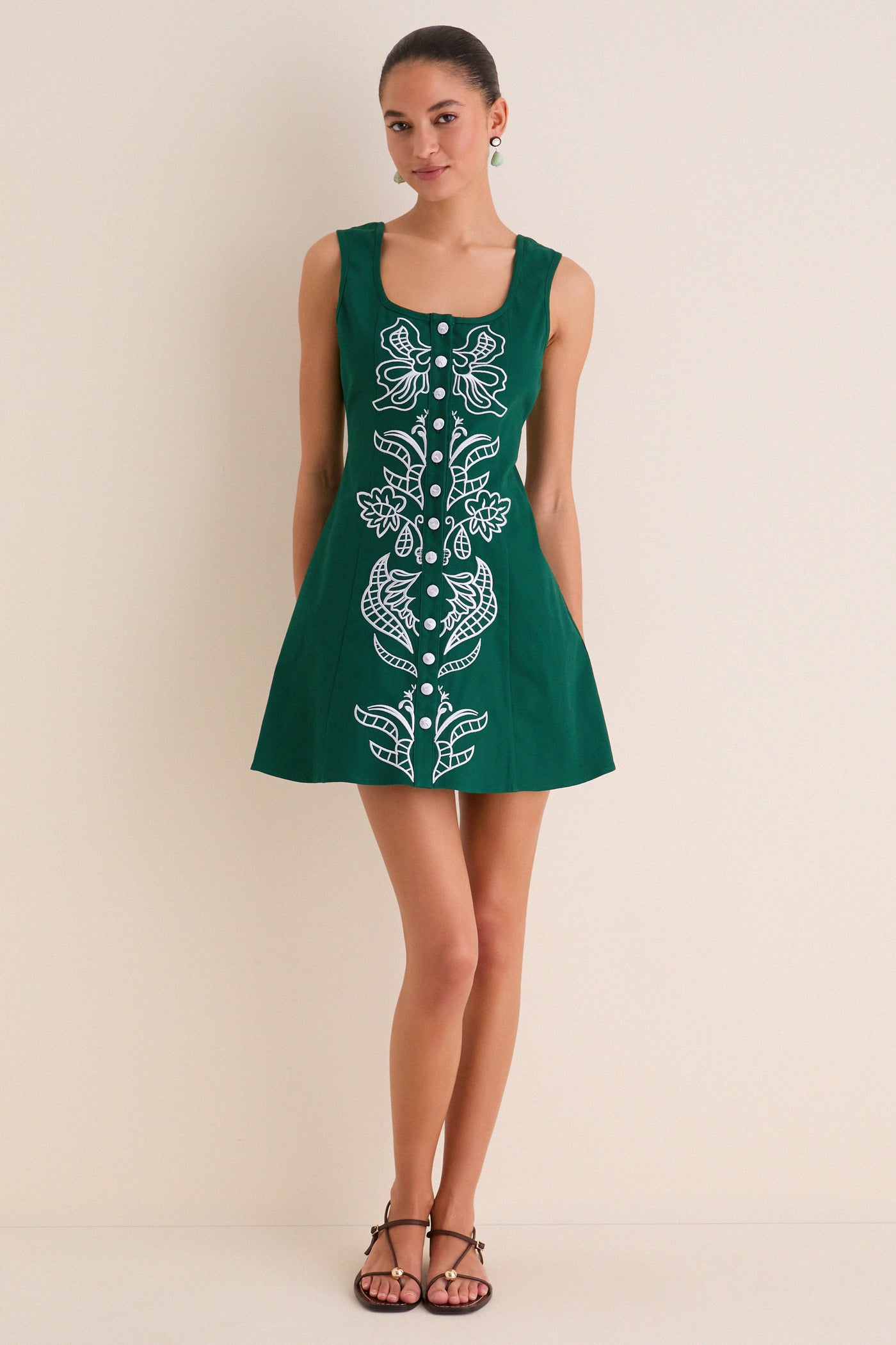 Model in a classic, effortless Green & Baby Blue Embroidered Lucy Mini Dress, featuring a fit-and-flare silhouette, front buttons, and playful floral embroidery.