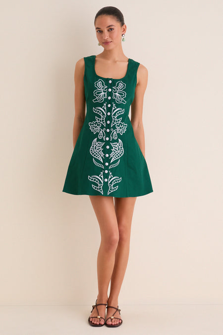 Model in a classic, effortless Green & Baby Blue Embroidered Lucy Mini Dress, featuring a fit-and-flare silhouette, front buttons, and playful floral embroidery.
