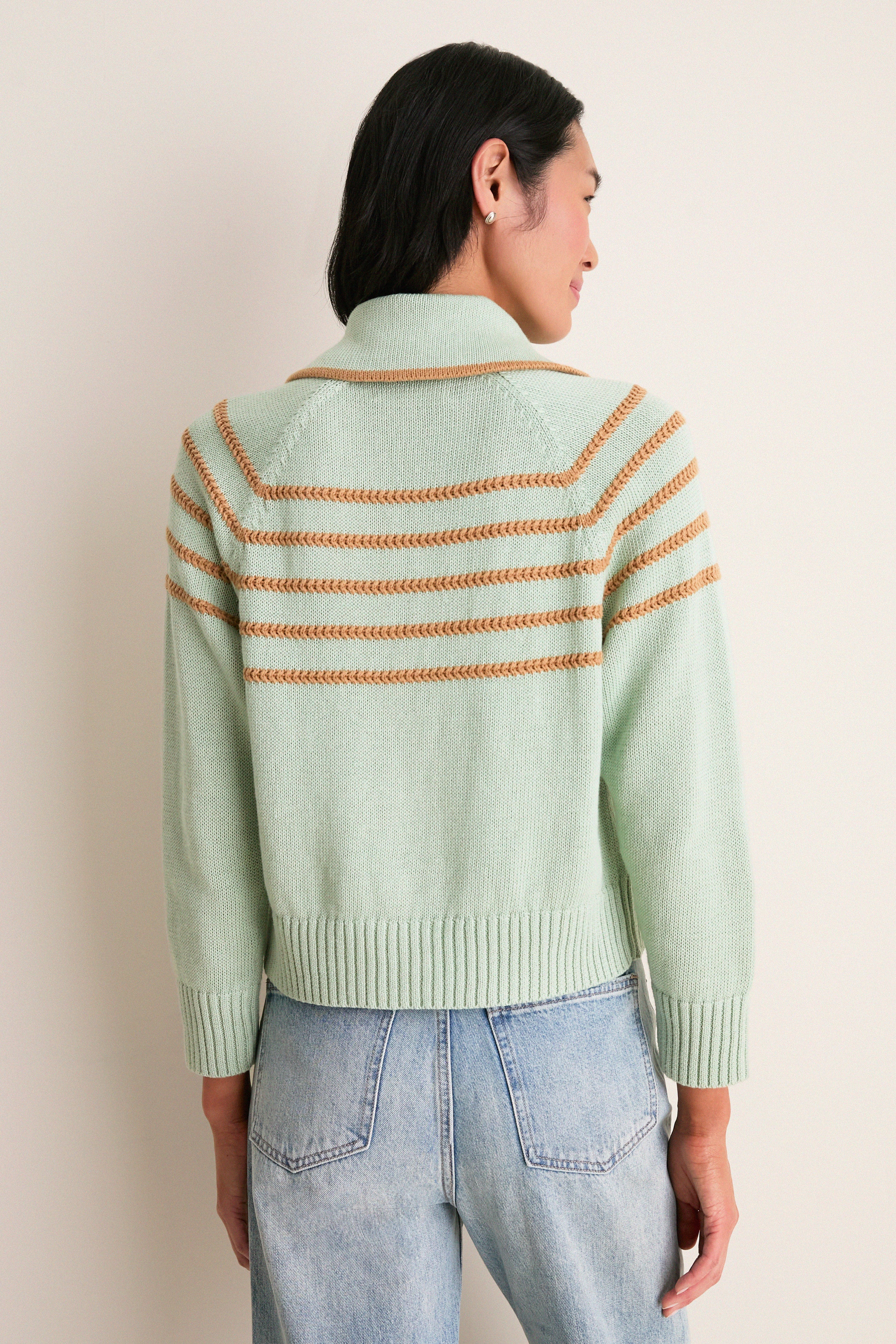 Seafoam Scholar Cardigan with Crochet Stripes, featuring a classic design, effortless raglan sleeves, and fun rib-knit trim, paired with high-waisted jeans for a high-end look.
