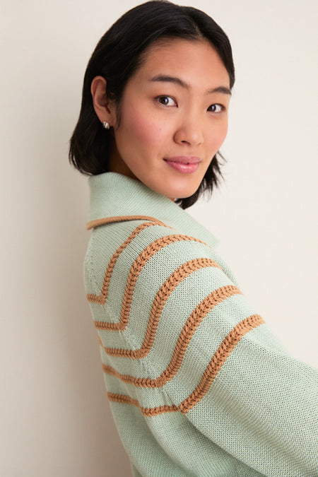 Young woman in profile wearing the Seafoam Scholar Cardigan with Crochet Stripes, featuring a classic oversized collar and textured knit, embodies effortless, high-end style.