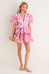 Young woman in a classic, effortless summer dress with Cotton Candy and Gold Cumulus Earrings, holding a woven clutch, embodying a fun, high-end style.
