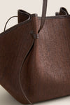 Fudge Large Woven Raffia Mochi Bag, a classic, high-end tote with basket-weave texture, leather trim, and adjustable handle, perfect for effortless, fun, everyday use.