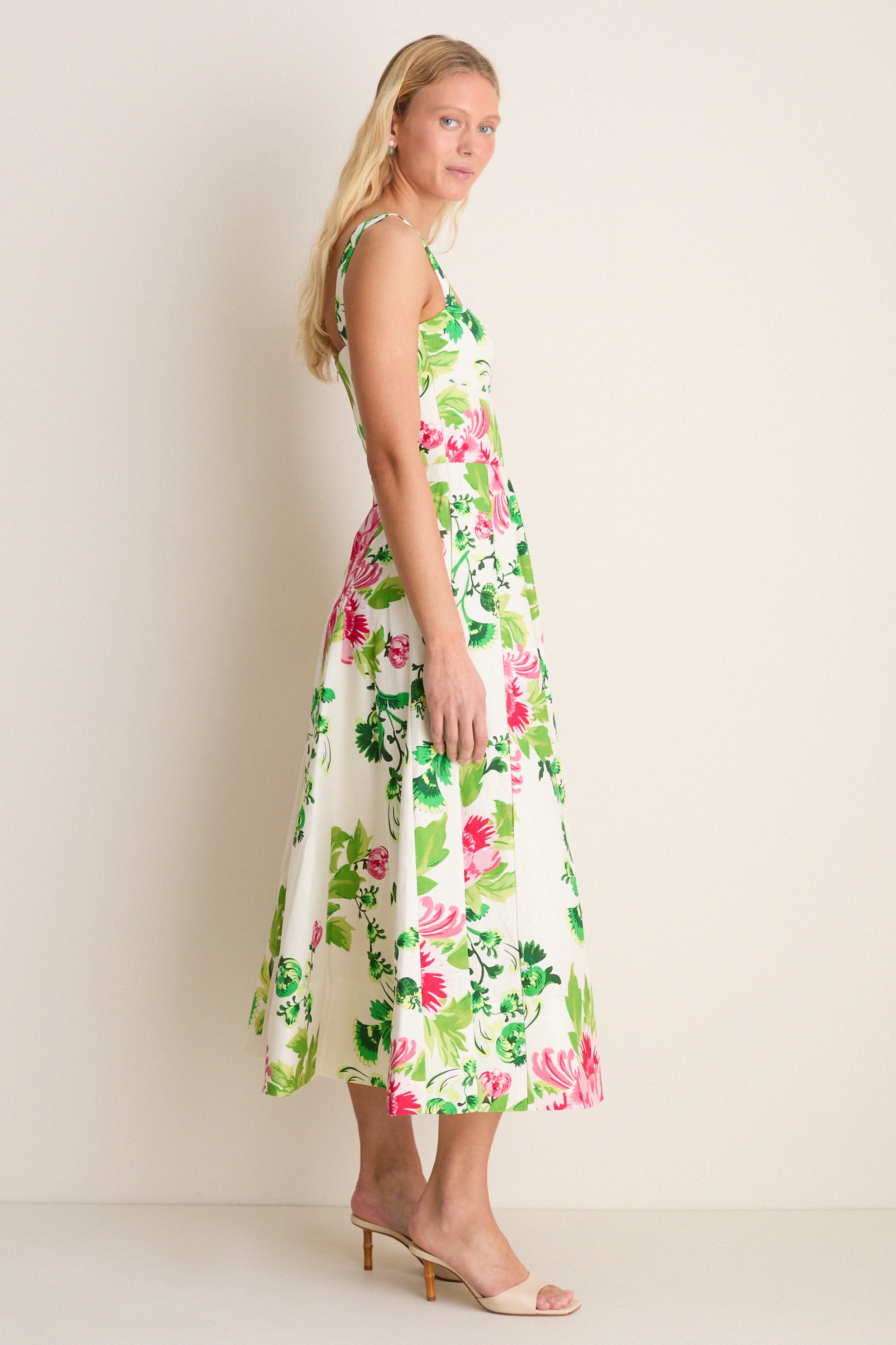 Saffier Bouquet Sabrina Midi Dress on a woman, showcasing a classic, effortless look with blooming florals, square neckline, and flared skirt, embodying high-end, fun elegance.