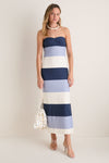 Woman in the Blue Stripes Sono Maxi Dress, showcasing classic nautical elegance with fun, effortless style, featuring a sweetheart neckline and chic accessories.