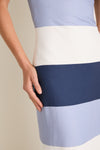 Close-up of a person wearing the classic Blue Stripes Sono Maxi Dress, showcasing its effortless and high-end nautical design with wide stripes and a fitted silhouette.