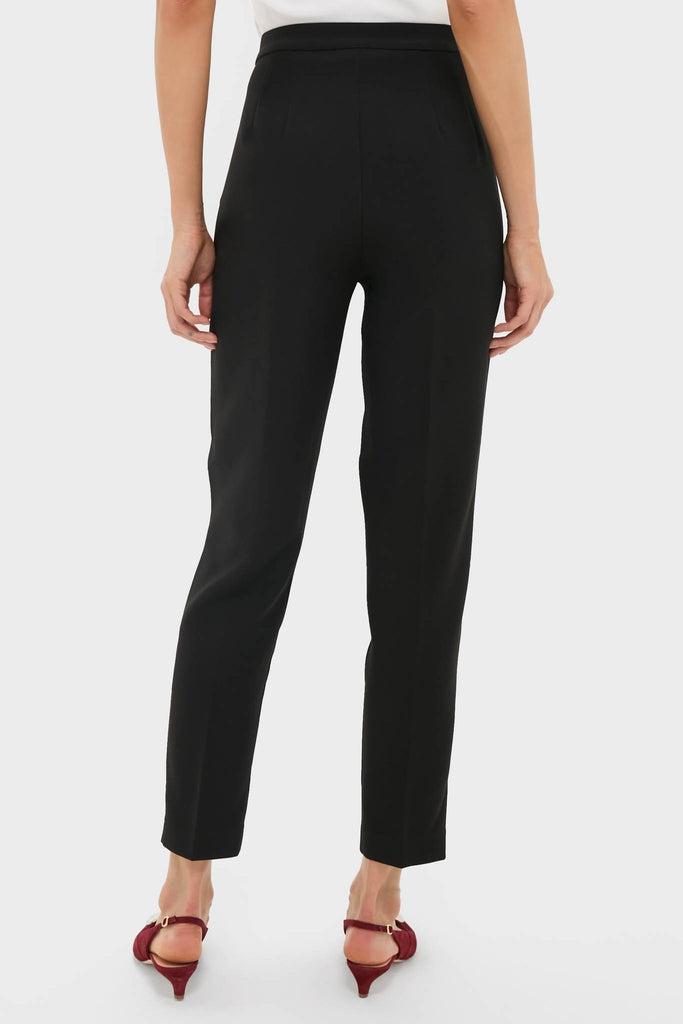 Black Audrey Pants with a classic slim, tapered fit. Effortlessly styled with burgundy kitten-heeled slingback sandals, showcasing a fun yet high-end look.