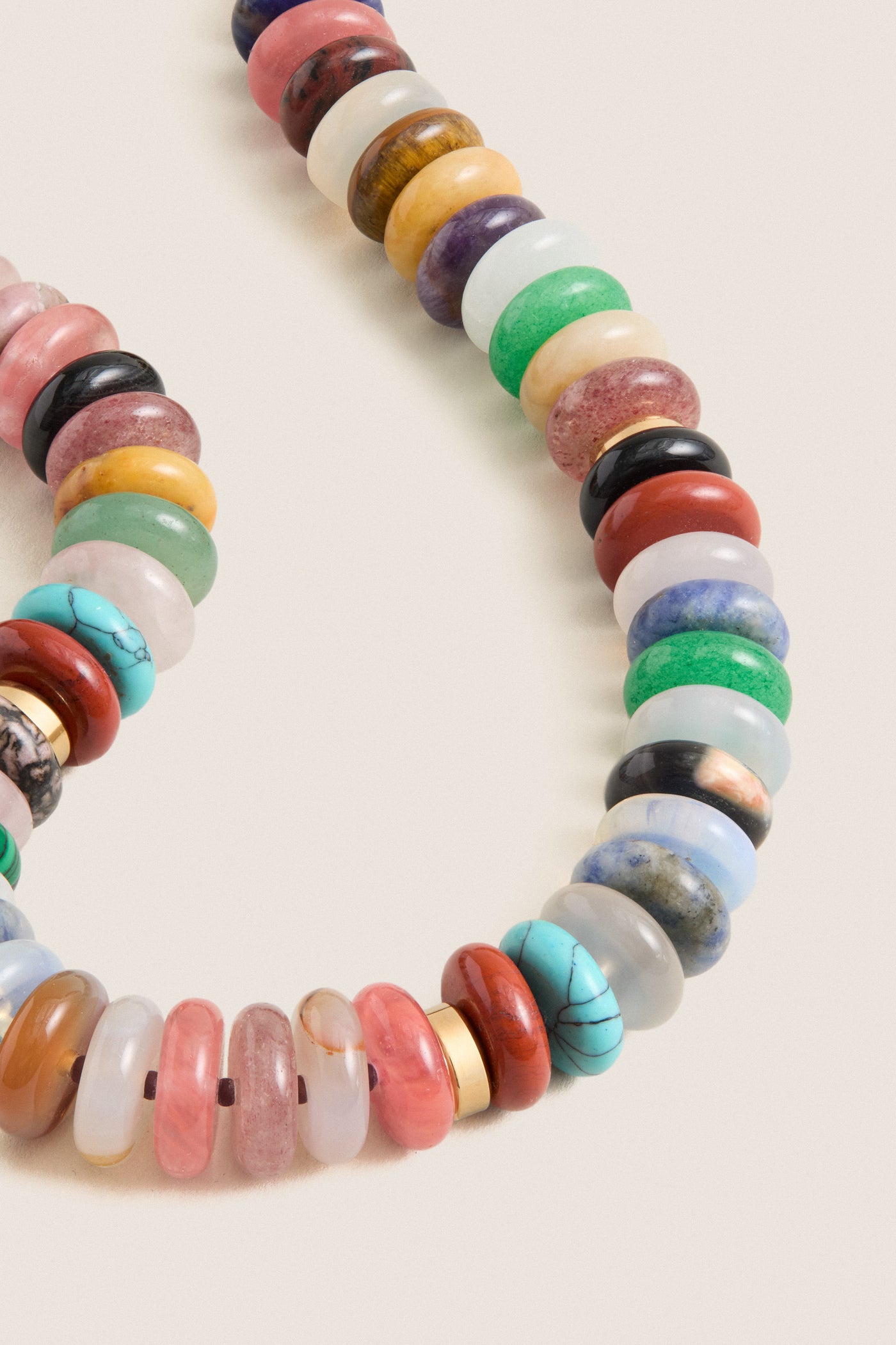 Multi Kairi Necklace features classic, hand-carved stone rondelles with gold-plated accents, offering an effortless, high-end look for fun, everyday wear.