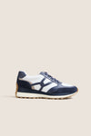 Navy Multi Valentina Sneakers feature a classic, effortless design with navy and white leather, suede overlays, and a gum-rubber sole, perfect for high-end, fun everyday wear.