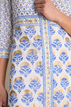 Classic Arbor Blue Maxi Shirt Dress in lightweight cotton voile, featuring a blue-and-gold floral print, mother-of-pearl buttons, and three-quarter sleeves for an effortless, high-end look.