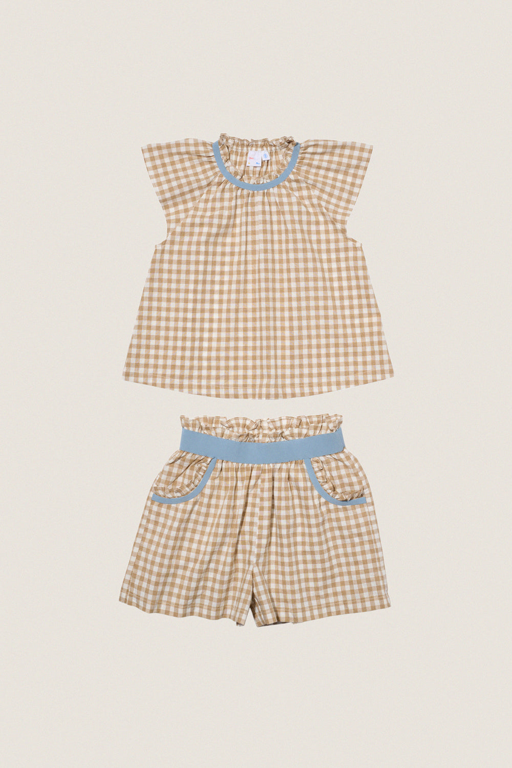 Camel Check Cecil Short Set: Classic gingham top and shorts, effortlessly chic with sky-blue accents. This fun, high-end outfit embodies easy, all-day comfort and style.
