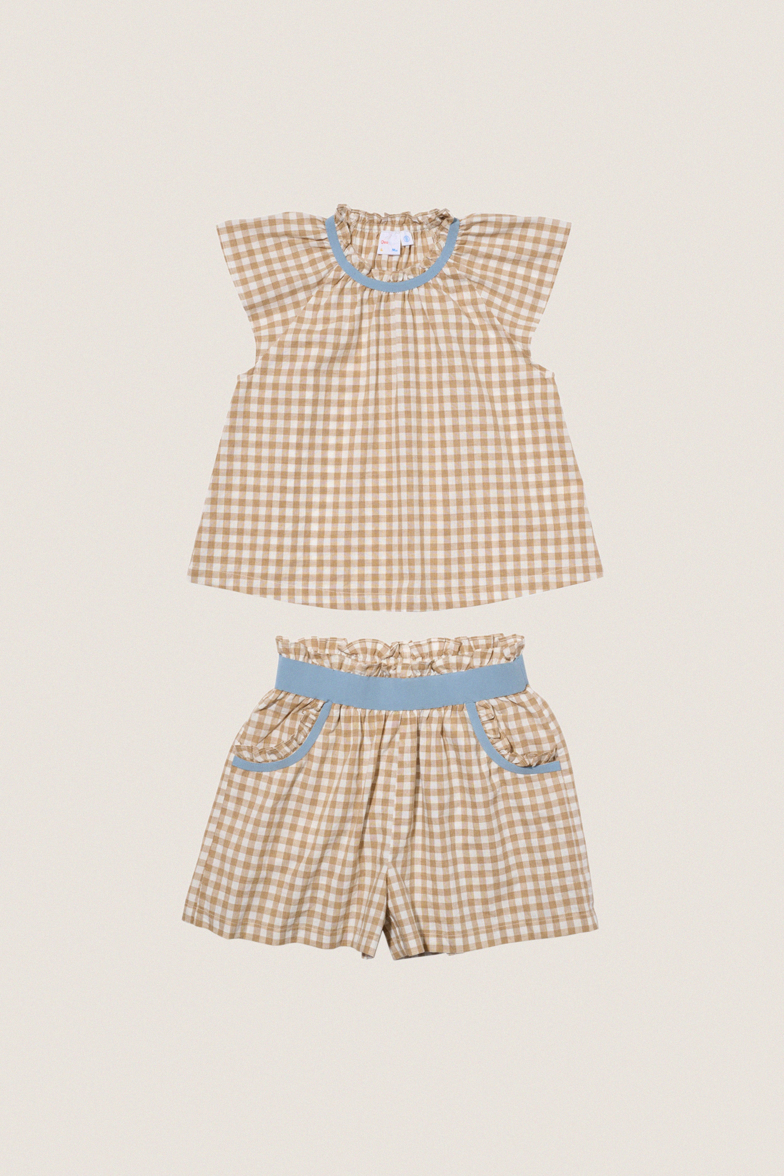 Camel Check Cecil Short Set: Classic gingham top and shorts, effortlessly chic with sky-blue accents. This fun, high-end outfit embodies easy, all-day comfort and style.