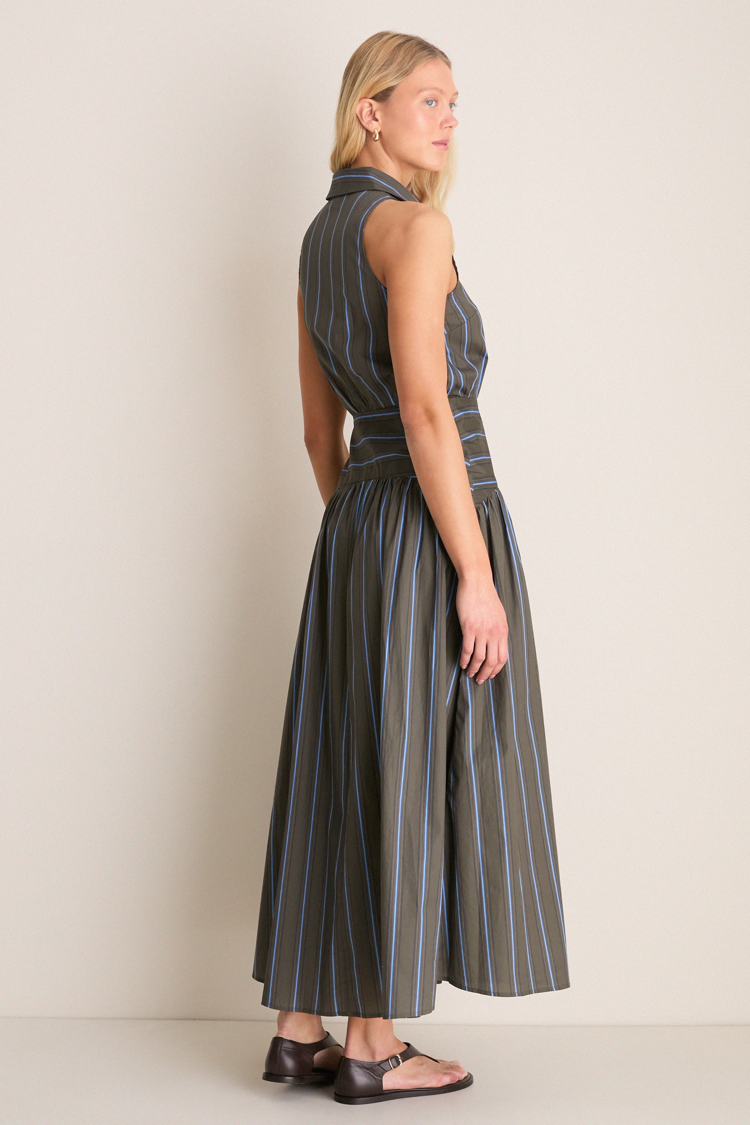 Huntington Stripe Romy Dress: A classic, sleeveless maxi with a collared neckline and button placket, offering an effortless, high-end style for fun day-to-night wear.