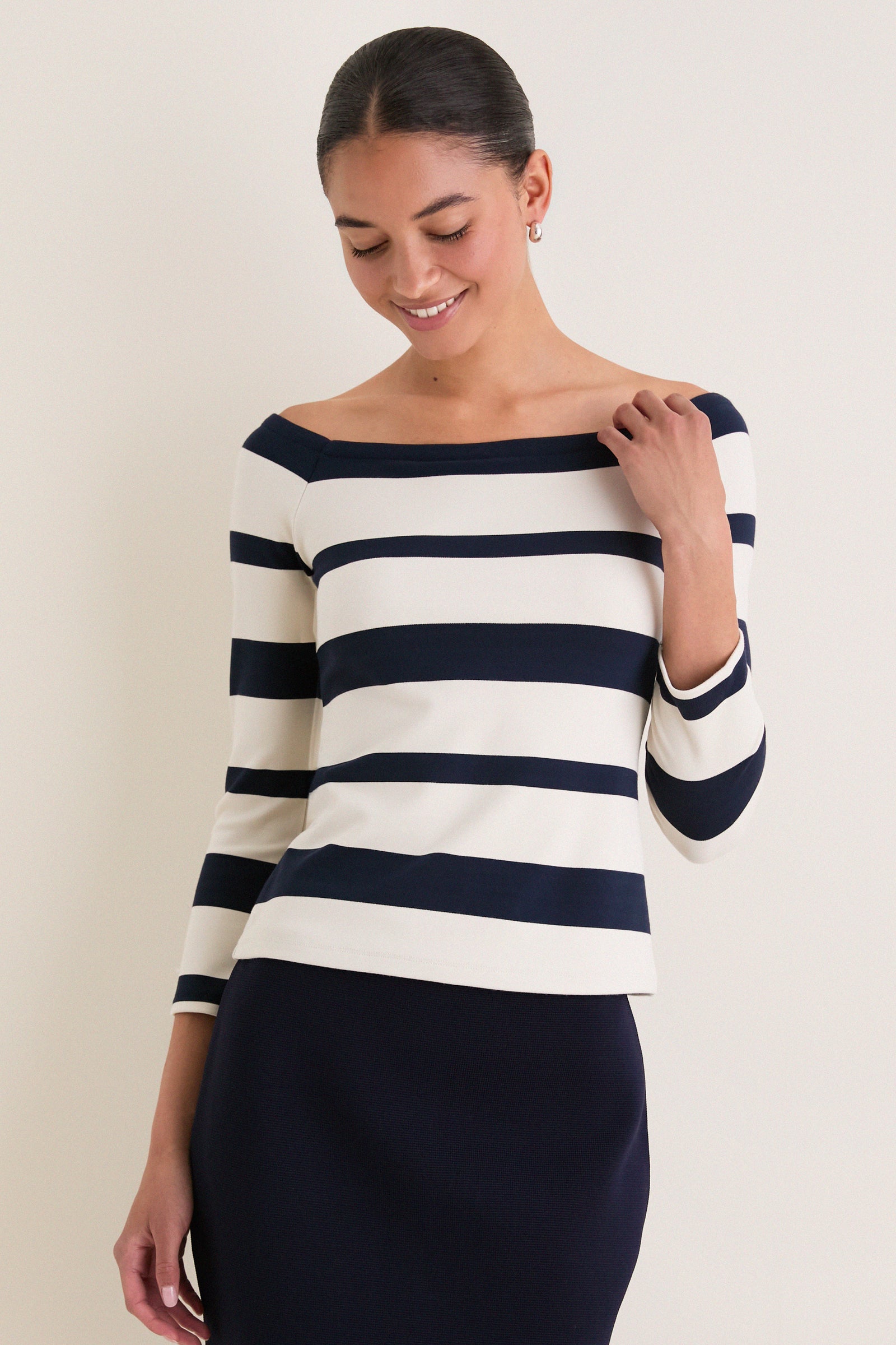 Liberty Stripe Knit Boyers Top: Classic, effortless design with three-quarter sleeves and variegated stripes, perfect for a high-end, fun, and versatile look.