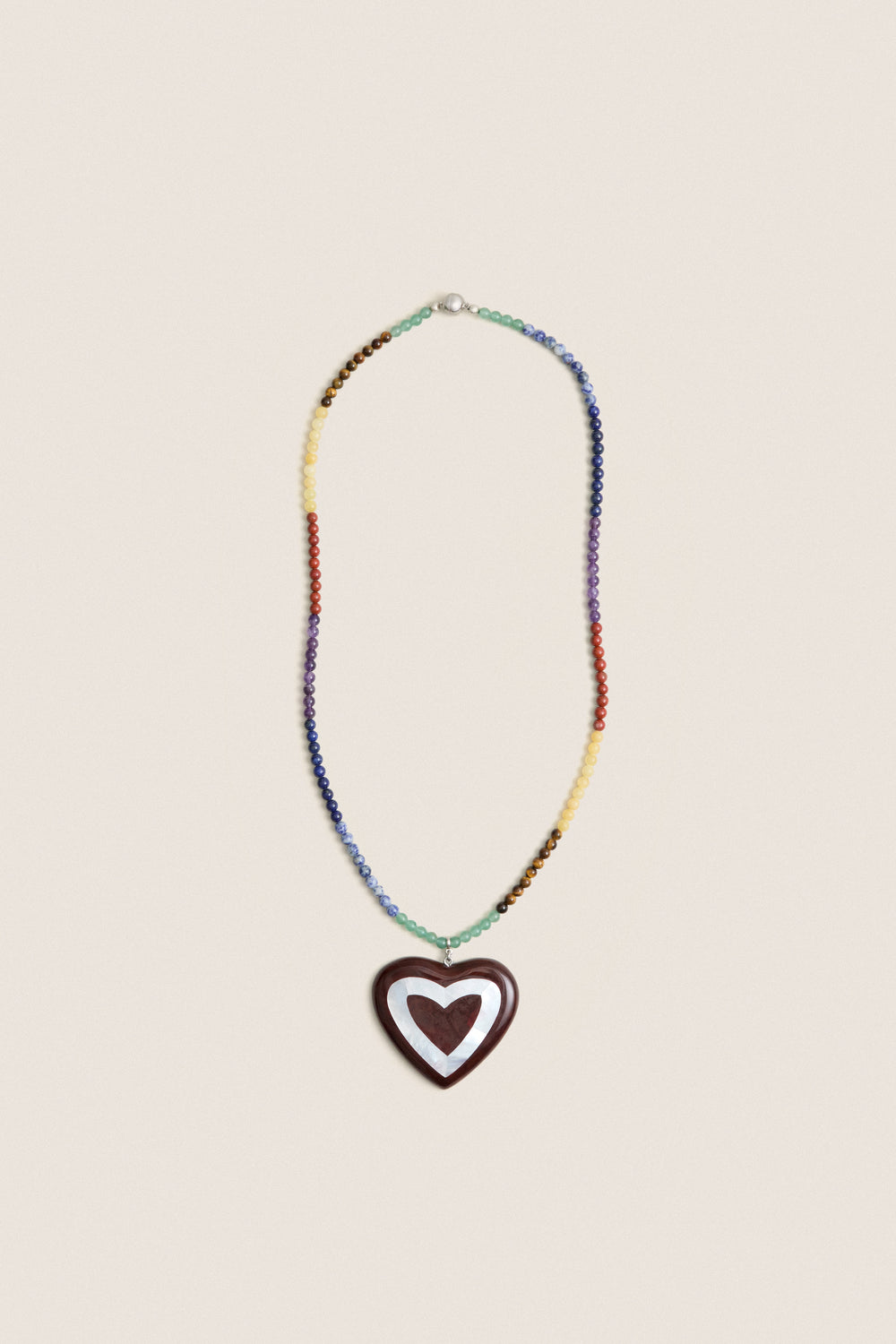 Multi Alma Necklace with rainbow acrylic beads and a dark heart pendant, offering a classic, effortless pop of color for a fun, high-end style.