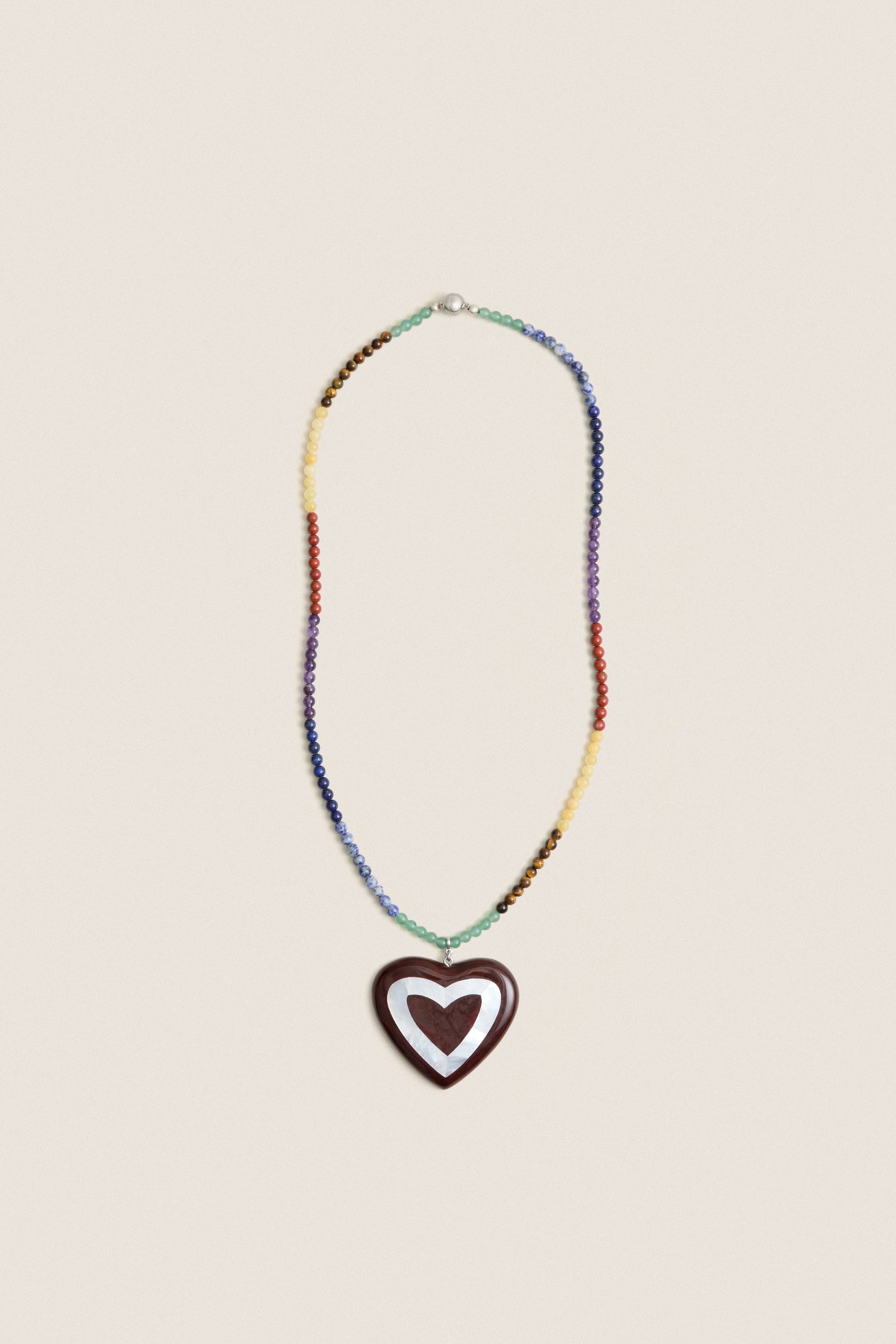 Multi Alma Necklace with rainbow acrylic beads and a dark heart pendant, offering a classic, effortless pop of color for a fun, high-end style.