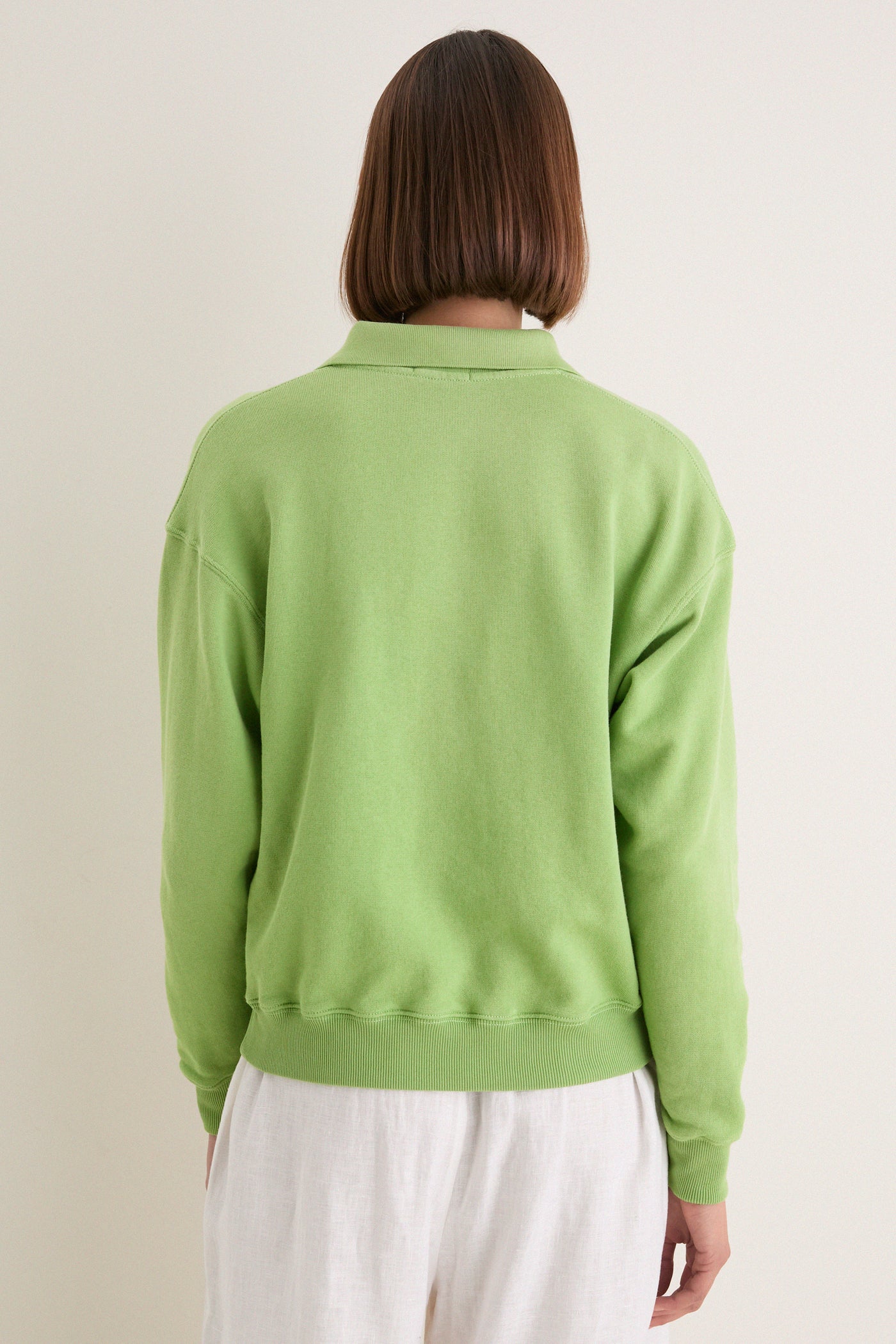Parakeet Green Island Fleece Knit Polo: Classic, effortless pullover with a relaxed fit, ribbed cuffs, and iconic embroidered Pony, perfect for high-end, fun style.