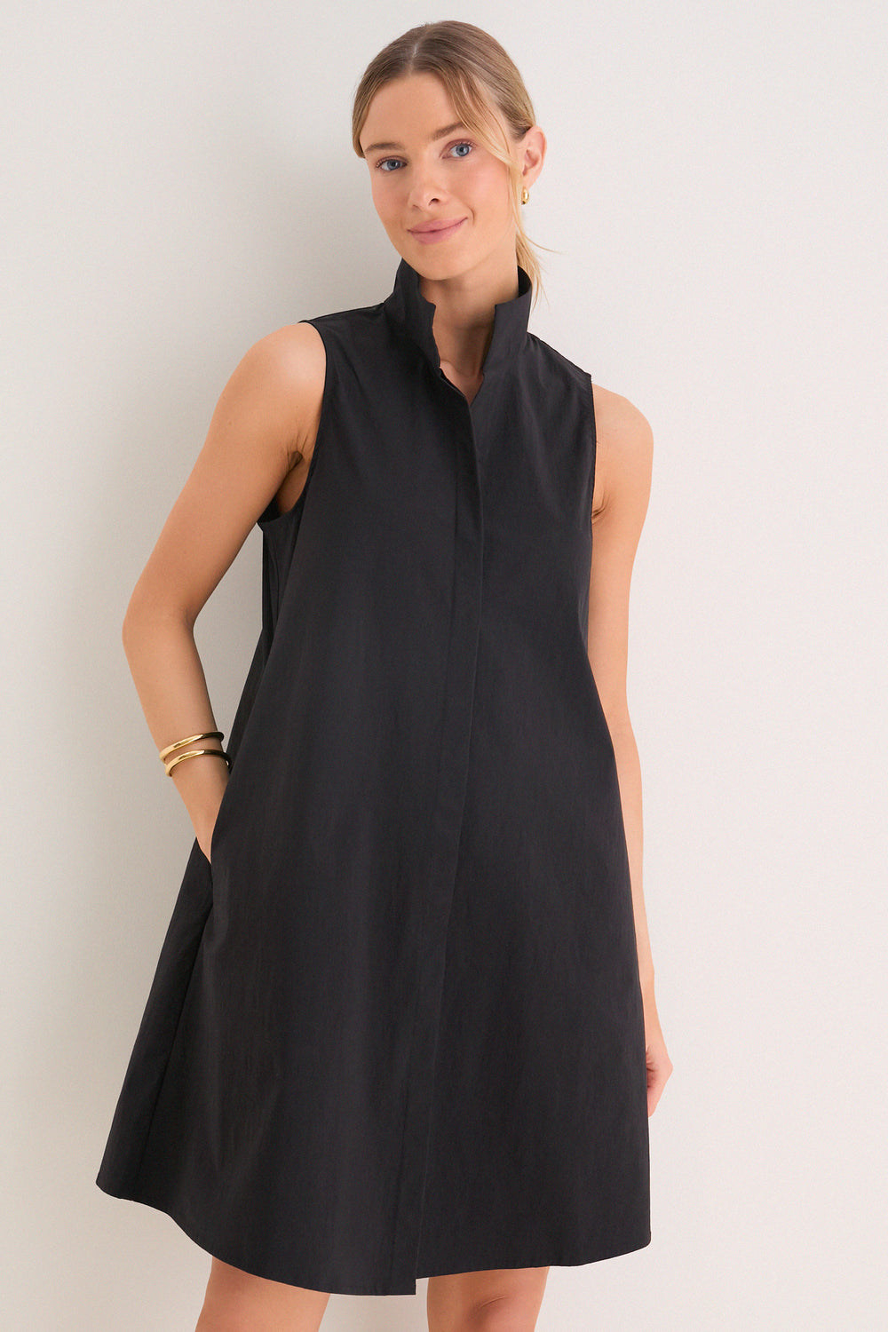 everyday black dress Essential Midi providing a playful and alluring peek of your legs as you walk or dance Tuckernuck Black Sleeveless Charlie Dress