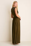 Woman in Olive Luna Column Dress with pleated skirt, front splits, and gold zip, exuding classic, effortless style. Perfect for high-end occasions, embodying fun sophistication.