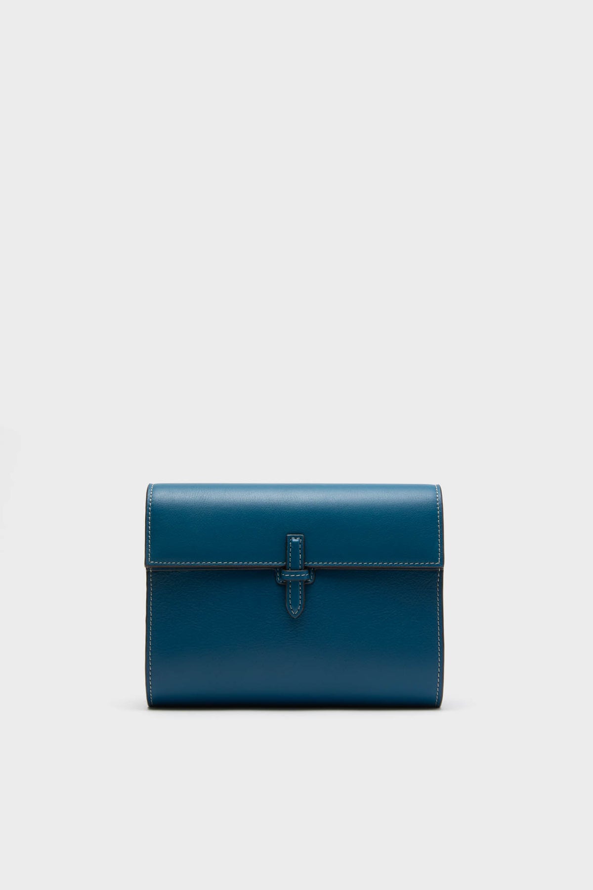 Teal Small Soft Clutch, a classic, high-end leather purse with a fold-over design and slip-through closure, embodies effortless elegance and fun sophistication.