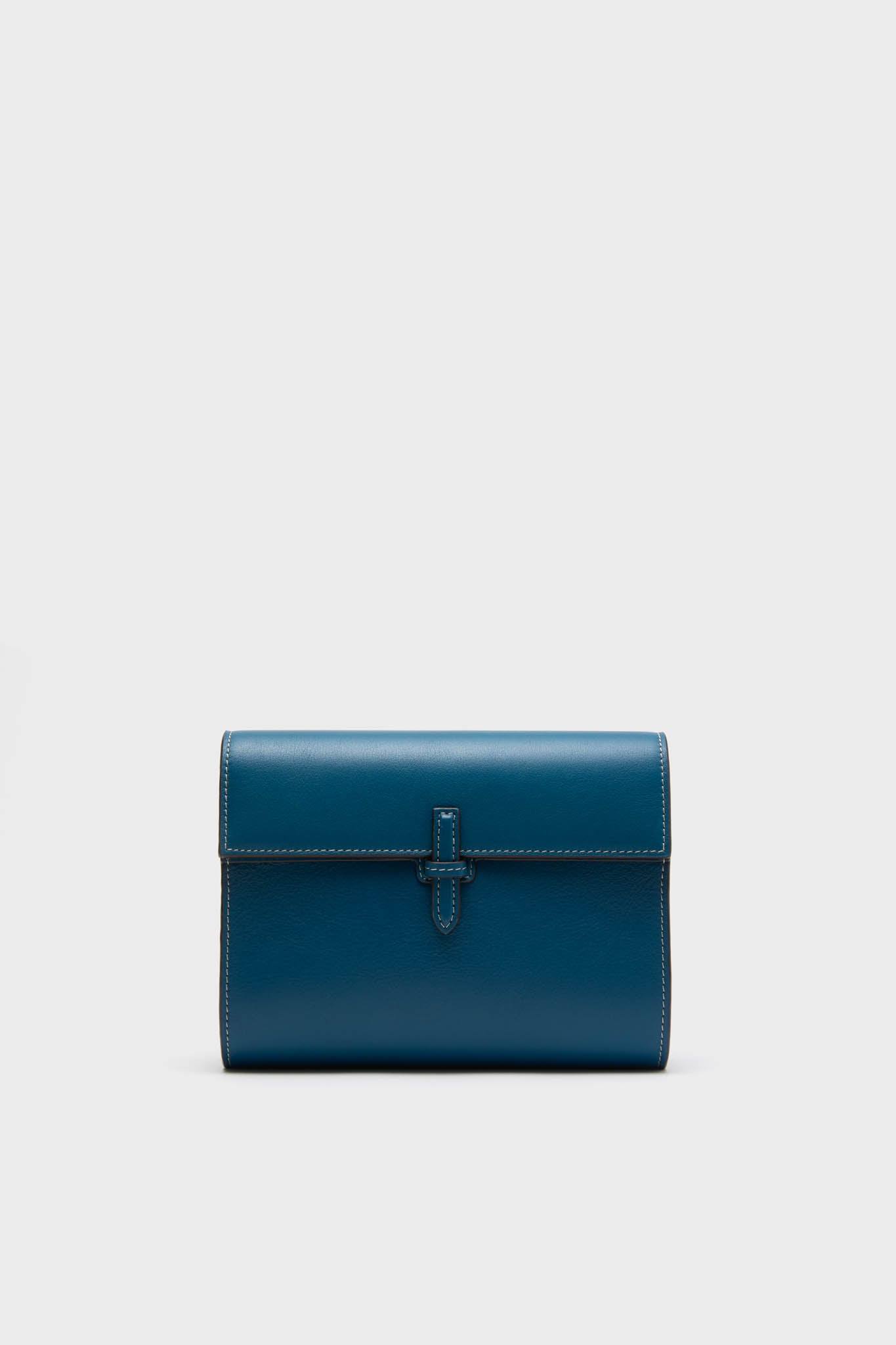 Teal Small Soft Clutch, a classic, high-end leather purse with a fold-over design and slip-through closure, embodies effortless elegance and fun sophistication.