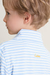Child in a classic, light blue-and-white striped Bachelor's Blue and White Le Club Polo, featuring discreet yellow Cadets embroidery on the back, embodying effortless, high-end style.