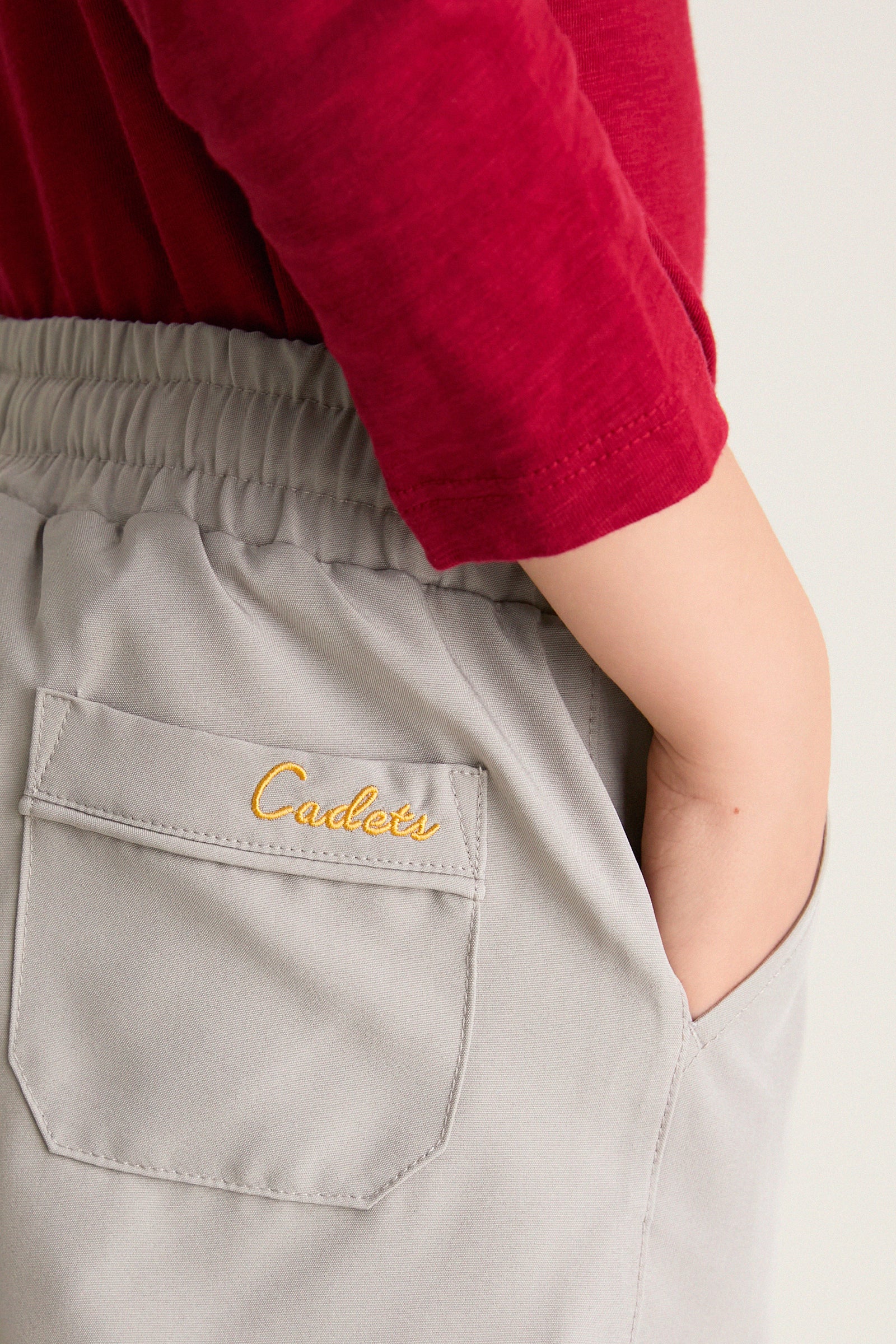 Patagonian Putty Le Club Short showcases a classic, effortless style with a yellow Cadets embroidery, offering a fun, high-end look with its elastic waistband and back pocket detail.
