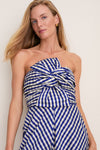 Ocean Gingham Kat Jumpsuit on model; classic strapless design with sweetheart neckline, oversized bow, and gathered fabric, conveying effortless, high-end, fun style.