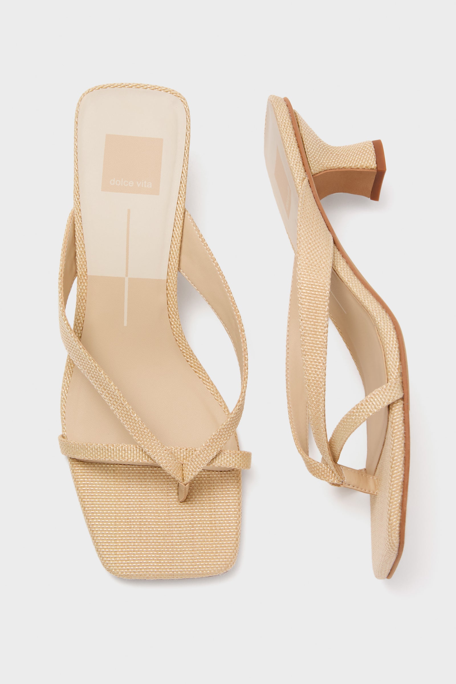 Light Natural Brevel Heels: classic women’s strappy sandals with a square-toe, effortless woven material, and low block heel, perfect for a fun, high-end look.