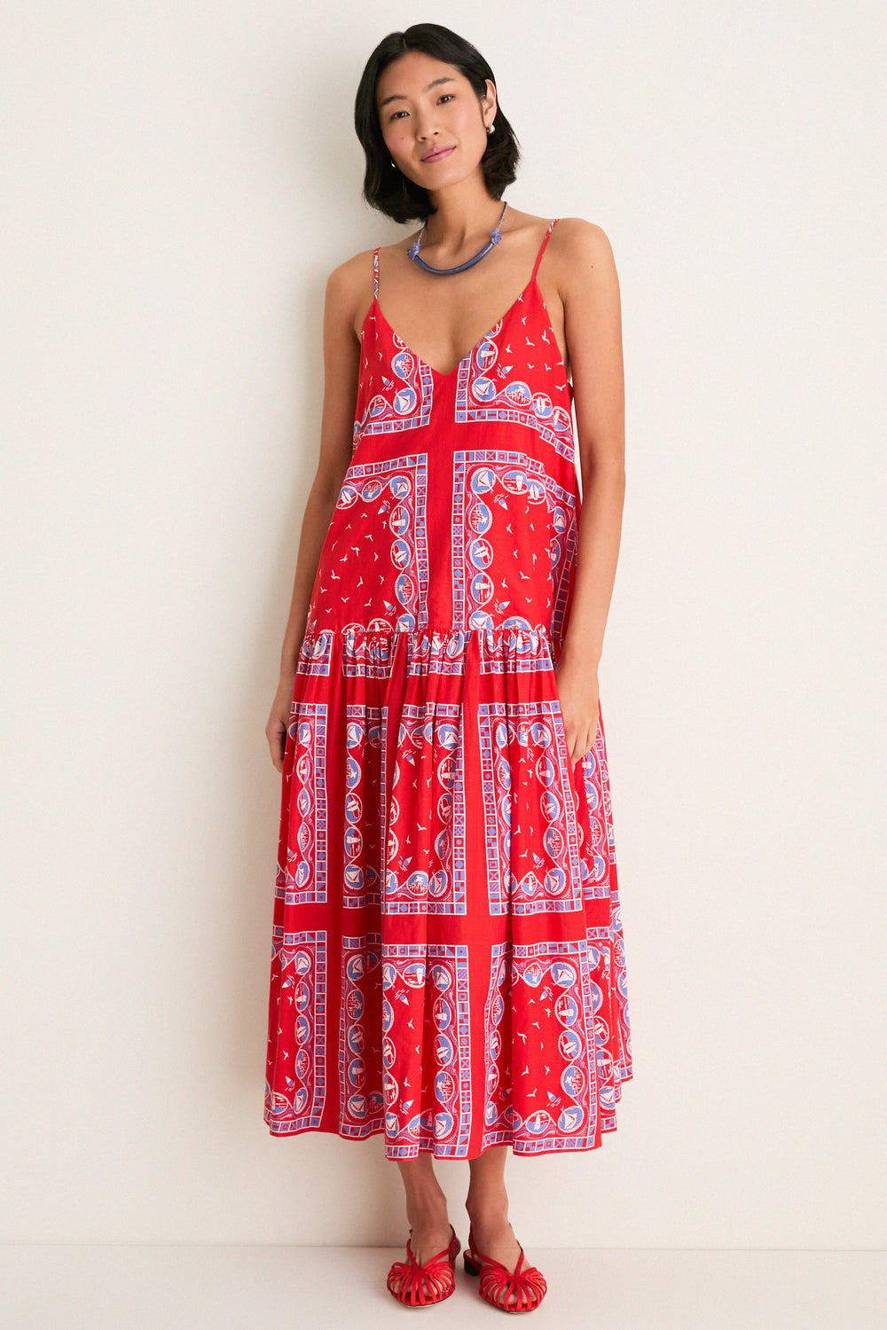 Red Sailboat Bandana Drop Waist Dress | THE GREAT. Red Sailboat Bandana Drop Waist Dress | THE GREAT.