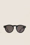 Classic Black Leonard Sunglasses with round lenses and a sleek key-hole bridge, embodying effortless style and fun luxury, perfect for high-end everyday wear.