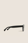Black Leonard Sunglasses with classic thick rectangular frames and dark lenses, embodying an effortless high-end style perfect for fun, everyday adventures and chic getaways.