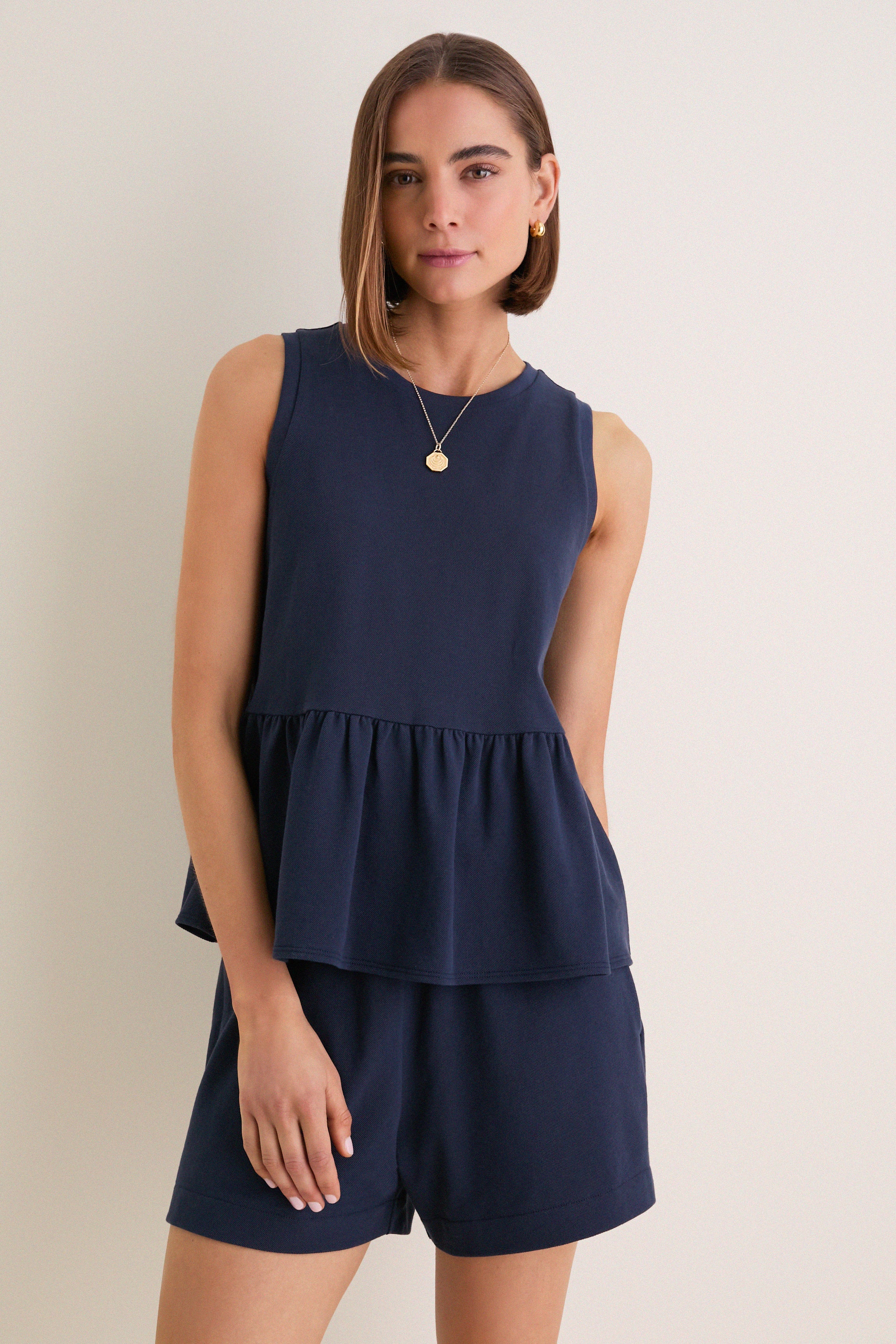 Navy Pique Mercer Peplum Top | Tuckernuck