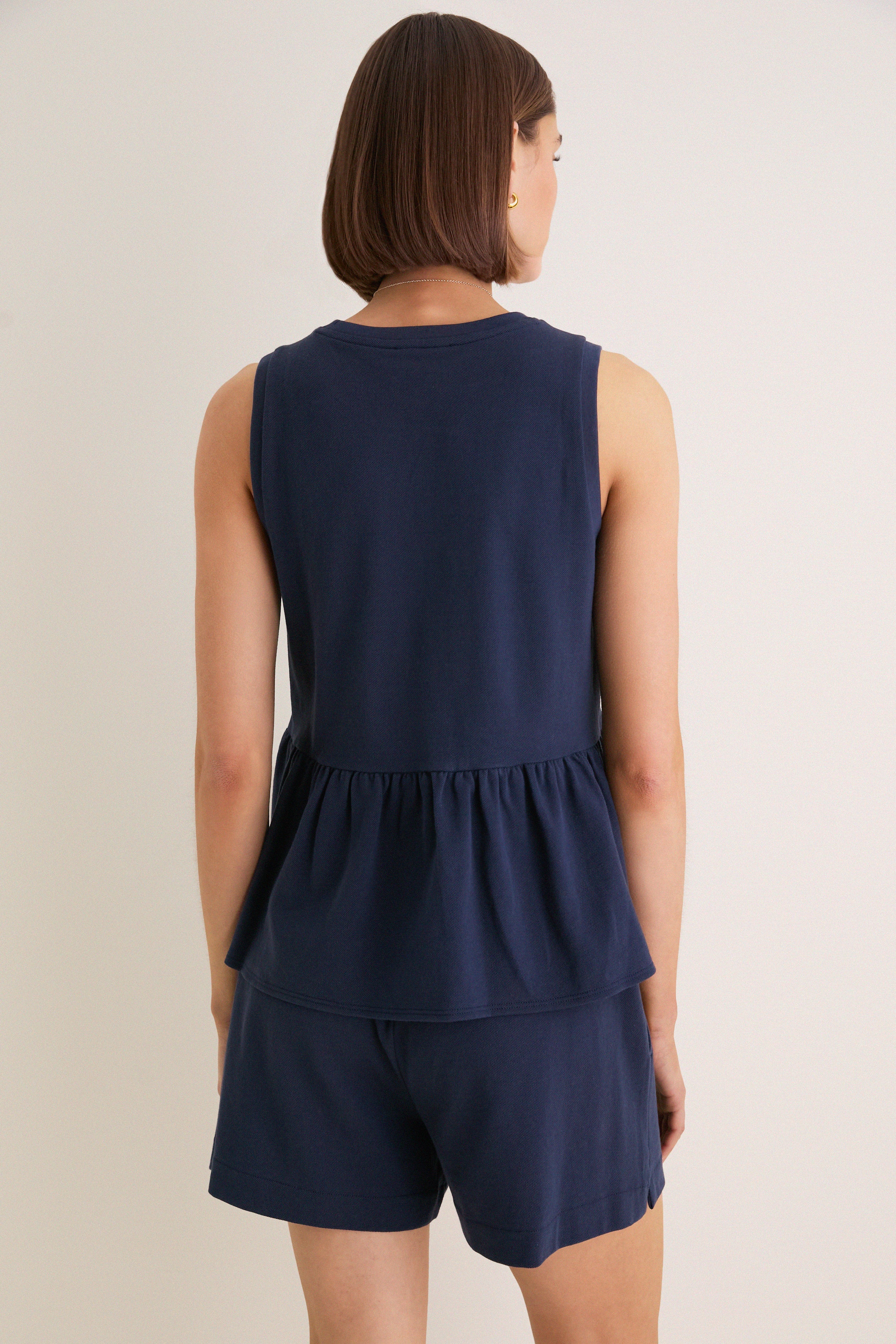 Navy Pique Mercer Peplum Top | Tuckernuck