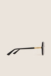 Shiny Black Judy Sunglasses feature classic black frames with a gold metal accent and etched Chloé logo, offering an effortless, high-end style for fun, confident wear.