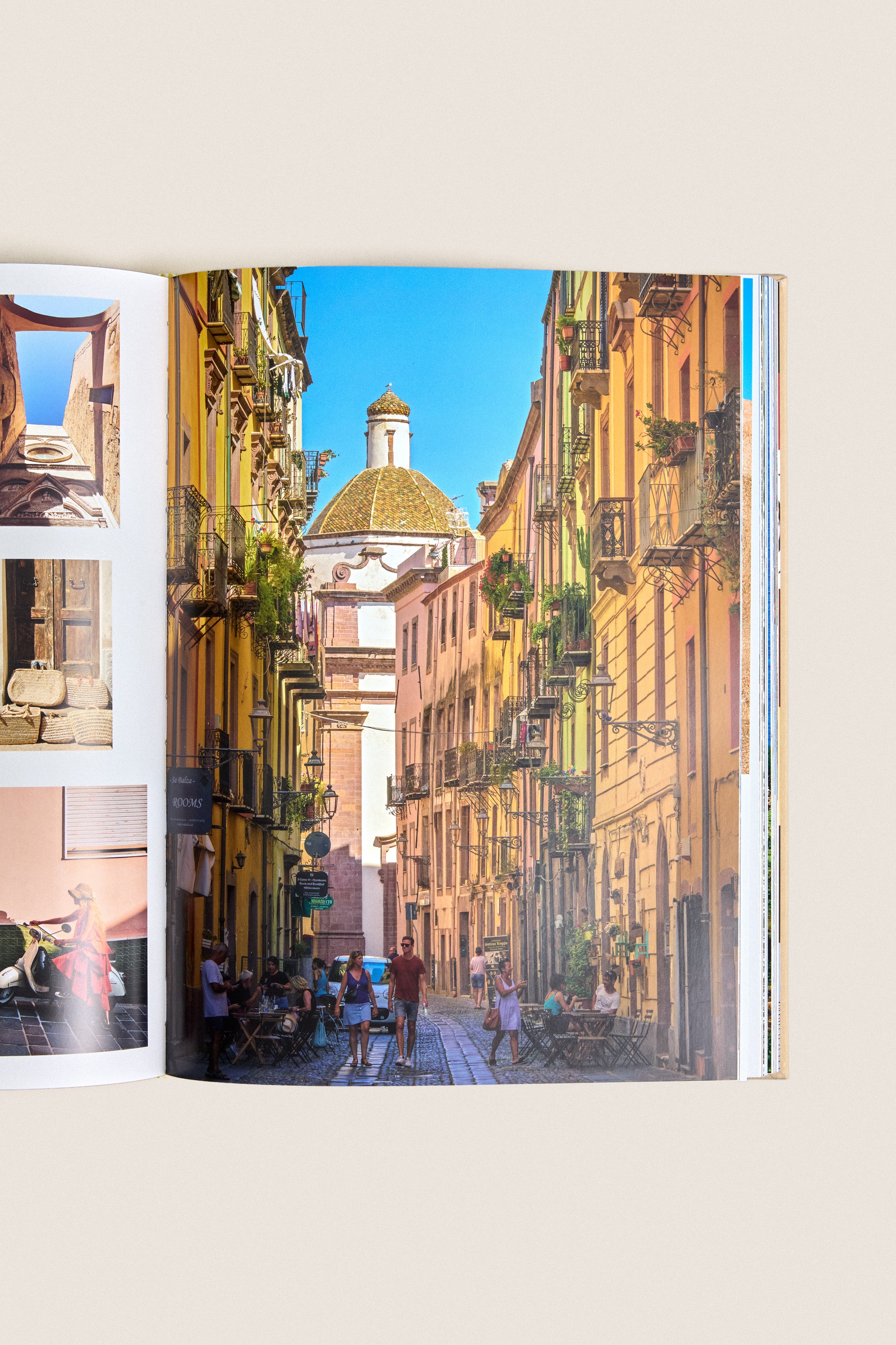Wine & Travel Mediterranean Islands: A classic spread captures an effortless, sunlit Italian street scene, embodying the high-end, fun essence of Mediterranean wine tourism.