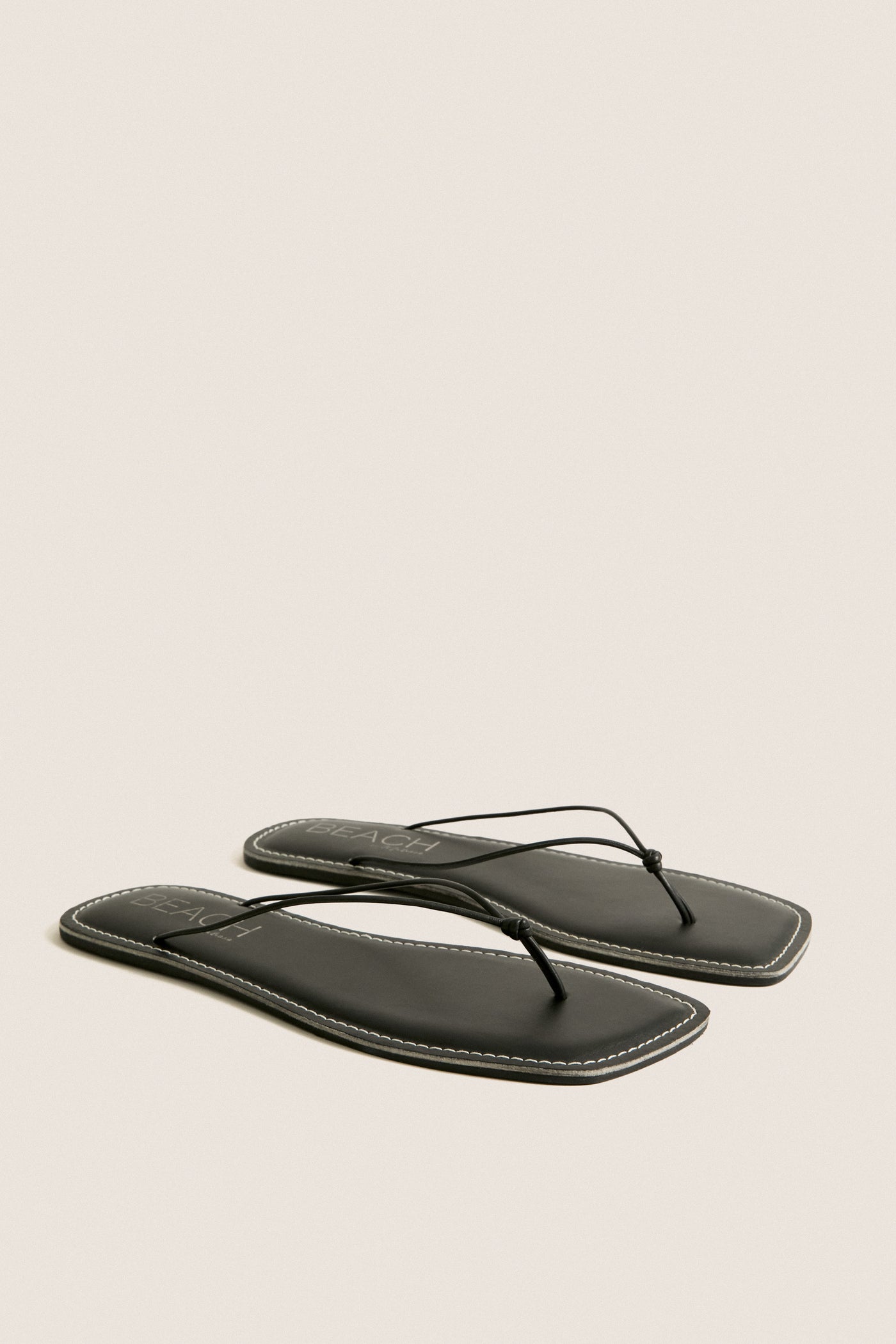 Black Ray Flip Flops