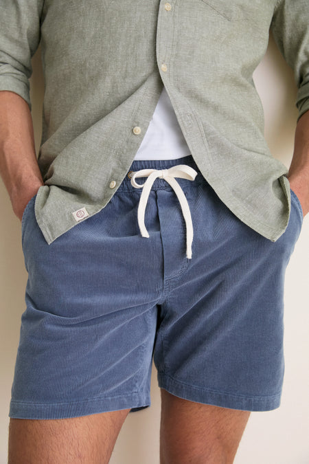 Faded Navy Saturday Corduroy Short: classic, effortless drawstring shorts with side pockets and hidden zipper, perfect for a fun, high-end summer style.