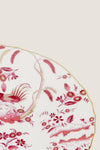 Oro Di Doccia Magenta Salad Plate, classic and high-end, features an effortless hand-painted red floral and rooster motif, gold-trimmed scalloped edge, embodying fun elegance.