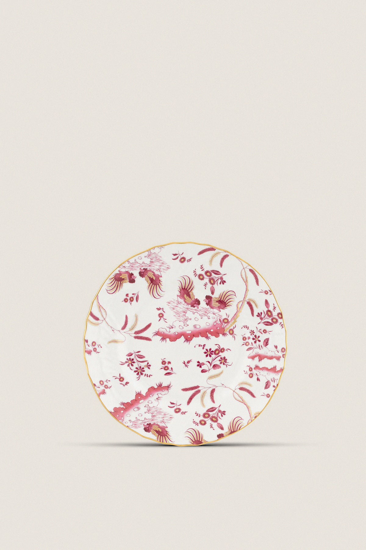 Oro Di Doccia Magenta Dinner Plate featuring classic floral and rooster motifs with gold trim, handcrafted in Italy for an effortless, high-end tablescape addition.