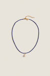 Lapis Lazuli Teeny Gemstone Necklace with Cloud Pearl Charm, featuring a classic, effortless design with high-end detailing, including an adjustable clasp and a fun, removable pearl pendant.