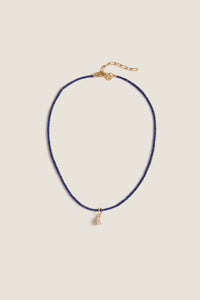 Lapis Lazuli Teeny Gemstone Necklace with Cloud Pearl Charm, featuring a classic, effortless design with high-end detailing, including an adjustable clasp and a fun, removable pearl pendant.