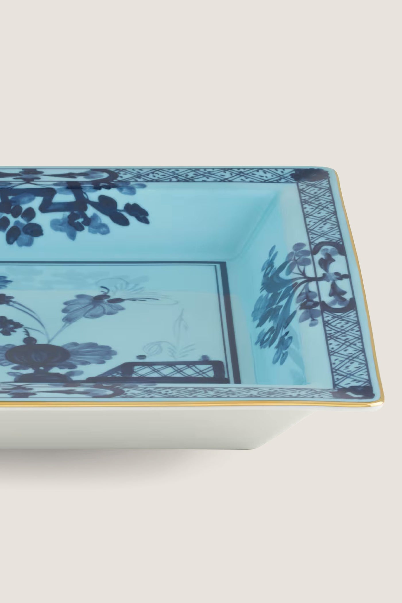 Oriente Italiano Iris Large Square Change Tray: a classic, high-end porcelain dish with a fun, effortless blue carnation motif, gold trim, and lattice design.