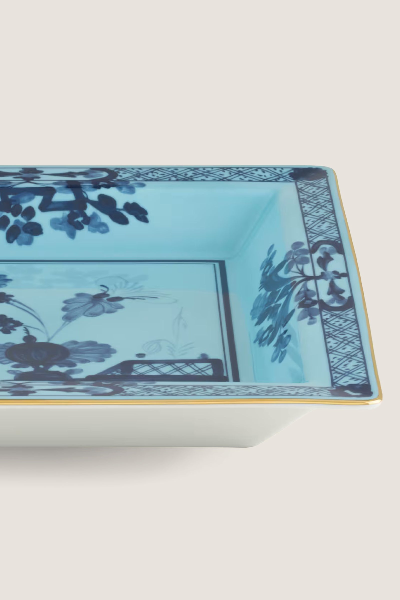 Oriente Italiano Iris Large Square Change Tray: a classic, high-end porcelain dish with a fun, effortless blue carnation motif, gold trim, and lattice design.